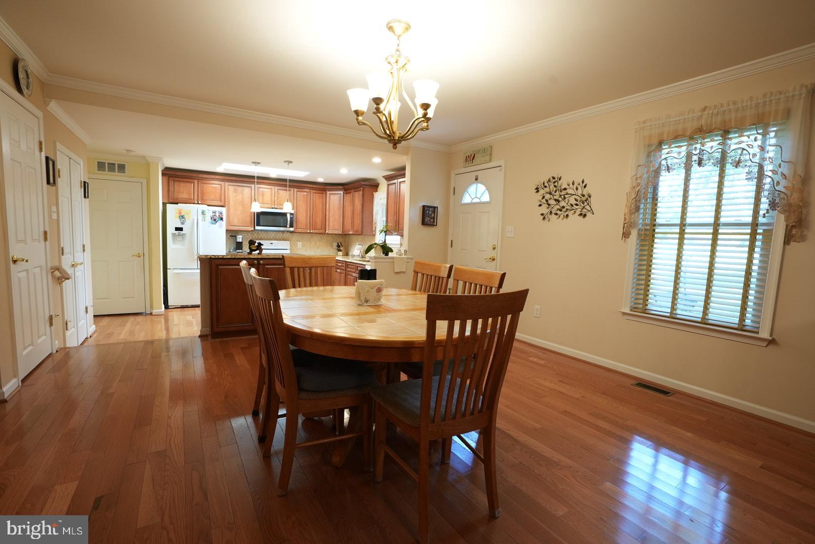 114 Salina Road Sewell, NJ 08080 - Photo 17 of 86 a view of a dining room with furniture window and wooden floor