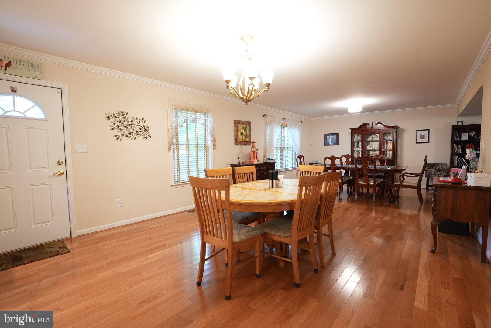 114 Salina Road Sewell, NJ 08080 - Photo 25 of 86 a view of a dining room with furniture window and wooden floor