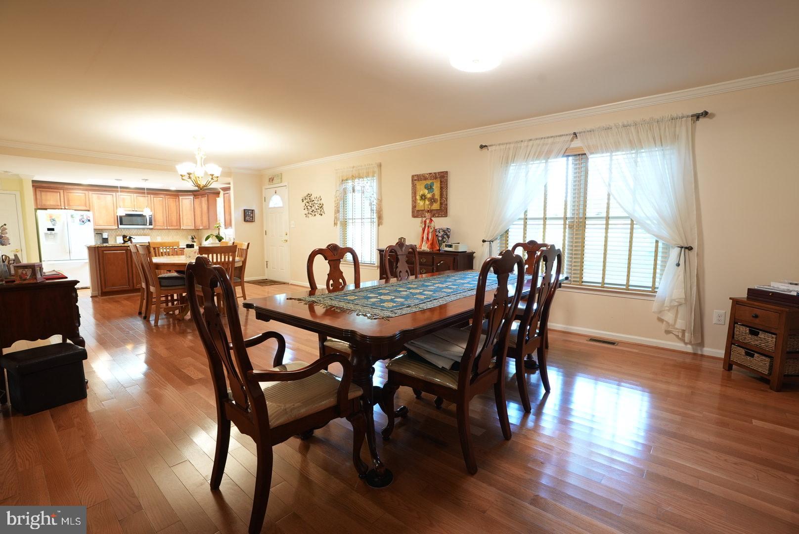 114 Salina Road Sewell, NJ 08080 - Photo 28 of 86 a view of a dining room with furniture window and wooden floor
