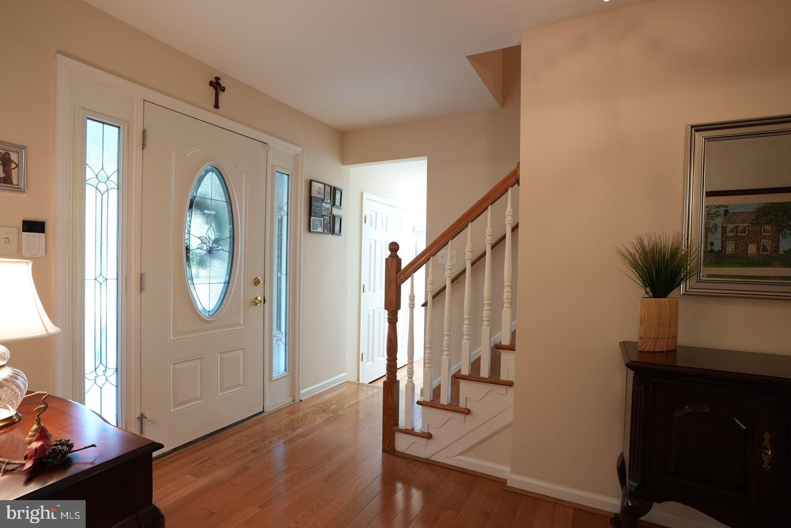 114 Salina Road Sewell, NJ 08080 - Photo 30 of 86 a view of a hallway with wooden floor and entryway