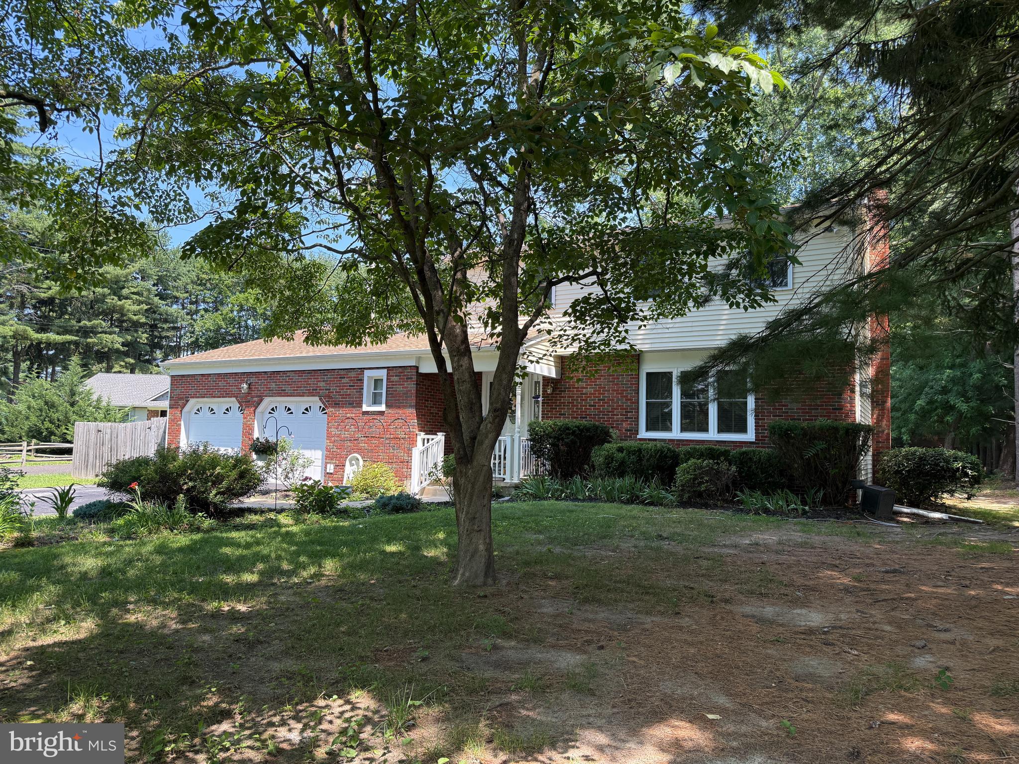 114 Salina Road Sewell, NJ 08080 - Photo 5 of 86 a view of a yard in front of a house with large trees