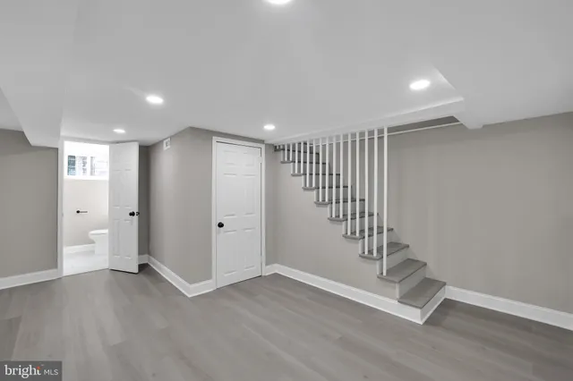 a view of entryway with wooden floor