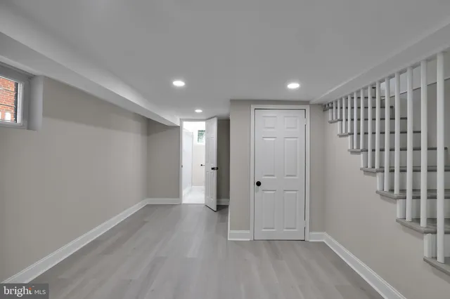 a view of entryway with wooden floor