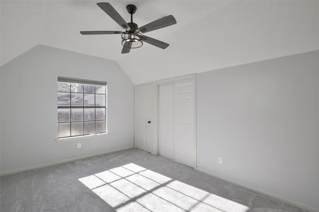 a view of a livingroom with a ceiling fan