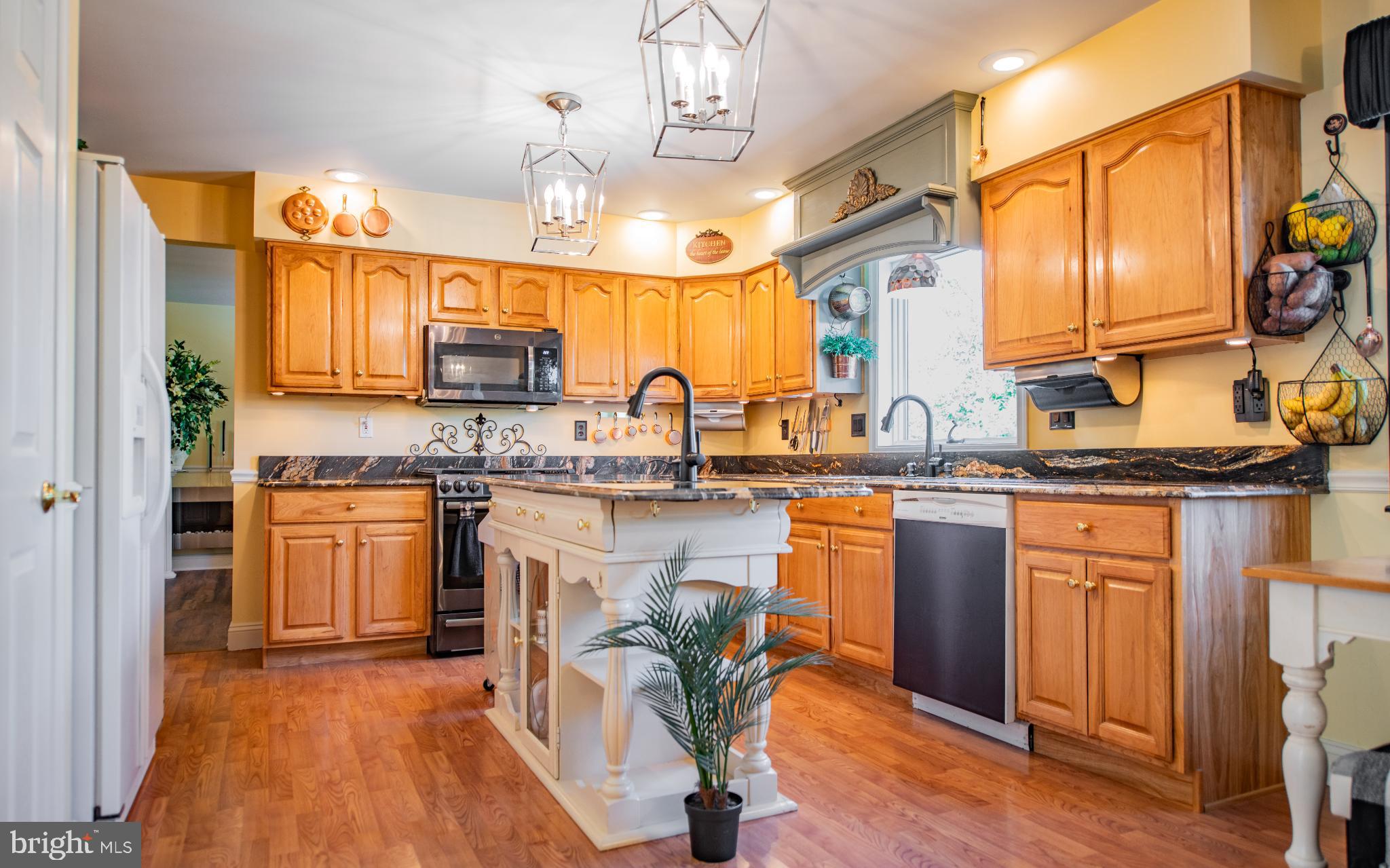 75 Pocahontas Trail Lock Haven, PA 17745 - Photo 11 of 49 a kitchen with stainless steel appliances granite countertop a sink a stove and a refrigerator
