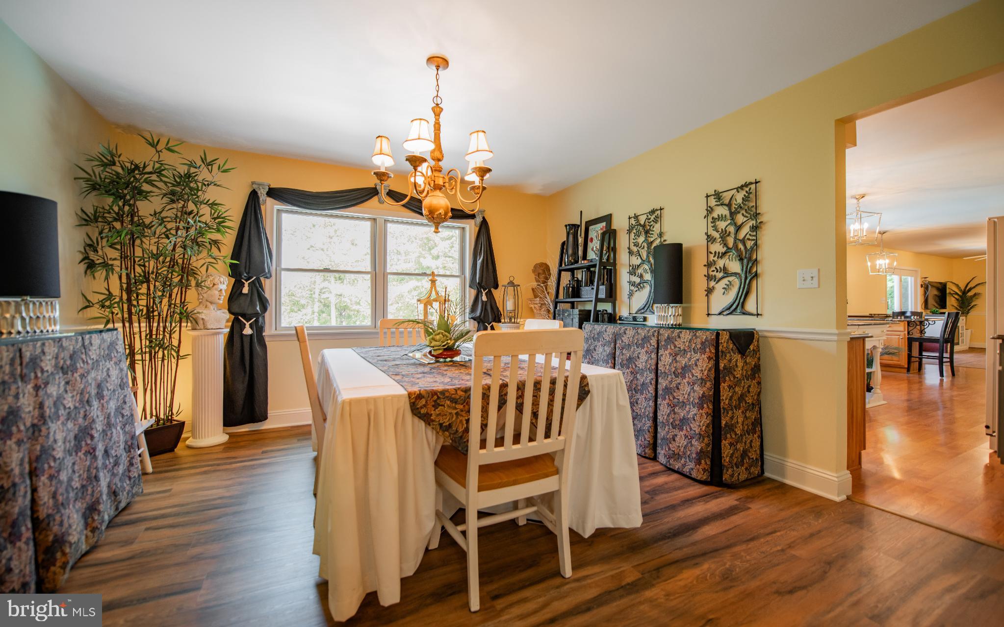75 Pocahontas Trail Lock Haven, PA 17745 - Photo 15 of 49 a view of a dining room with furniture window and wooden floor