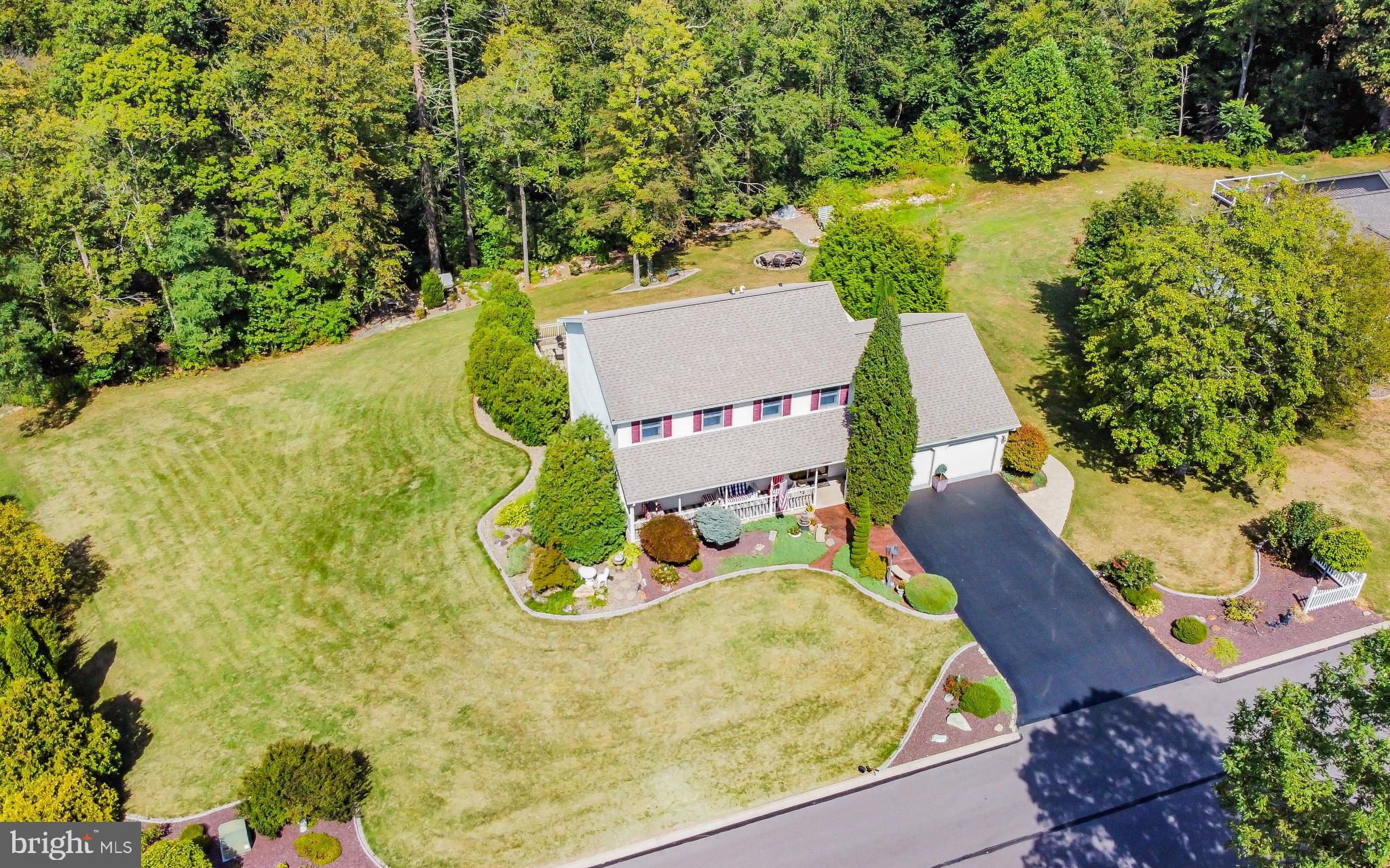 75 Pocahontas Trail Lock Haven, PA 17745 - Photo 2 of 49 an aerial view of a house with swimming pool and large trees