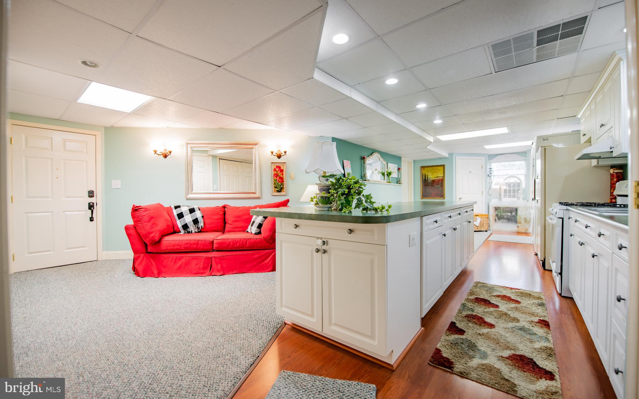 75 Pocahontas Trail Lock Haven, PA 17745 - Photo 25 of 49 a large white kitchen with kitchen island and stainless steel appliances