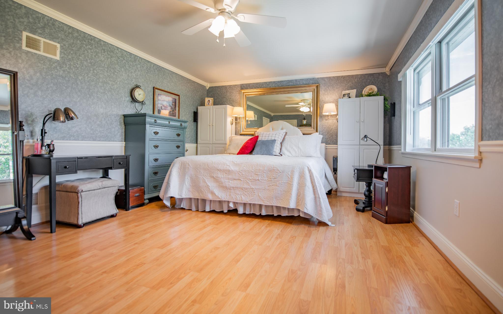 75 Pocahontas Trail Lock Haven, PA 17745 - Photo 32 of 49 a bedroom with a bed and wooden floor