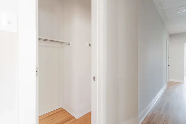 a view of a bedroom from the hallway