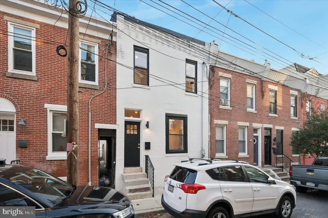 a car parked in front of a building