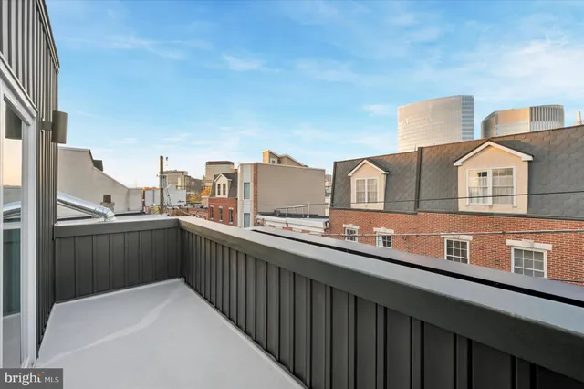 a balcony with a city view