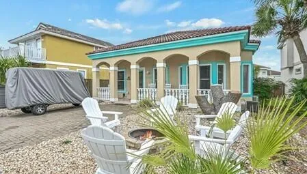 a front view of a house with patio