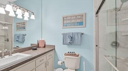 4765 Calatrava Court Destin, FL 32541 - Photo 14 of 34 a bathroom with a sink toilet and shower