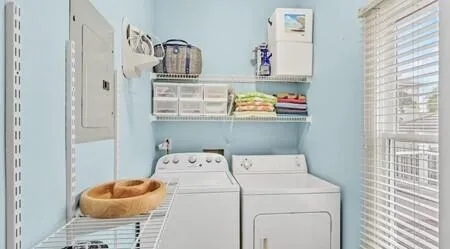 a utility room with dryer and washer