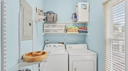 4765 Calatrava Court Destin, FL 32541 - Photo 20 of 34 a utility room with dryer and washer