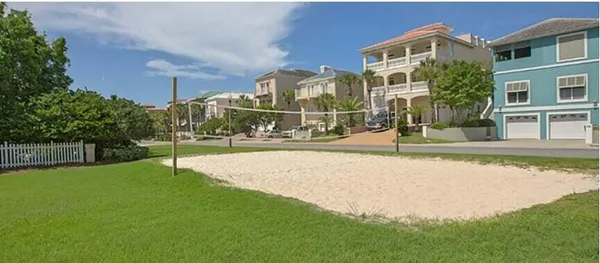 a view of a building with a yard