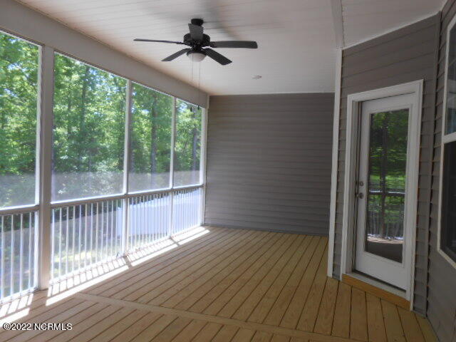 7816 Charters End Street Willow Spring, NC 27592 - Photo 16 of 17 SCREENED PORCH
