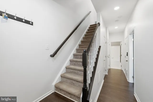 a view of a hallway with staircase