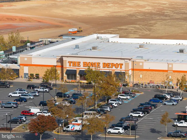 a view of a building next to a yard