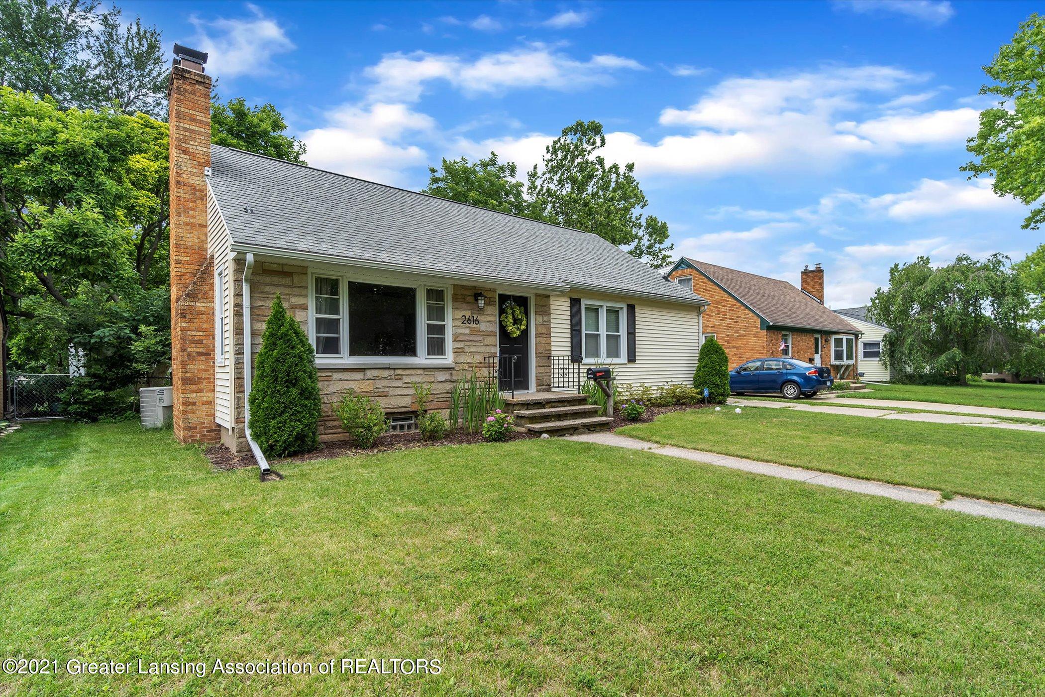 2616 Chatham Road Lansing, MI 48910 - Photo 2 of 51 02-2616 Chatham Rd-WindowStill-Real-Esta