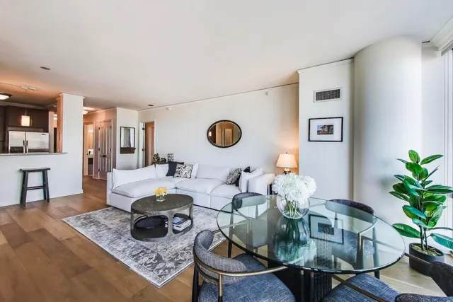 a living room with furniture and a table