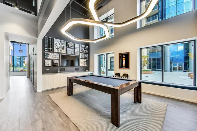 a lobby with furniture and window