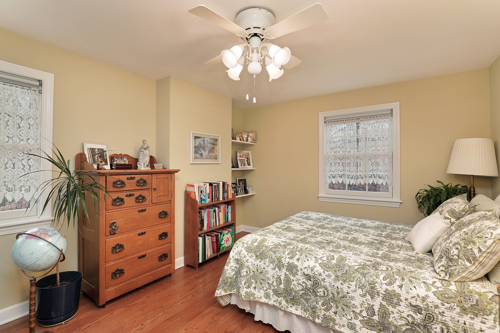 1211 Norman Lane Deerfield, IL 60015 - Photo 10 of 17 a bedroom with a bed and a dresser