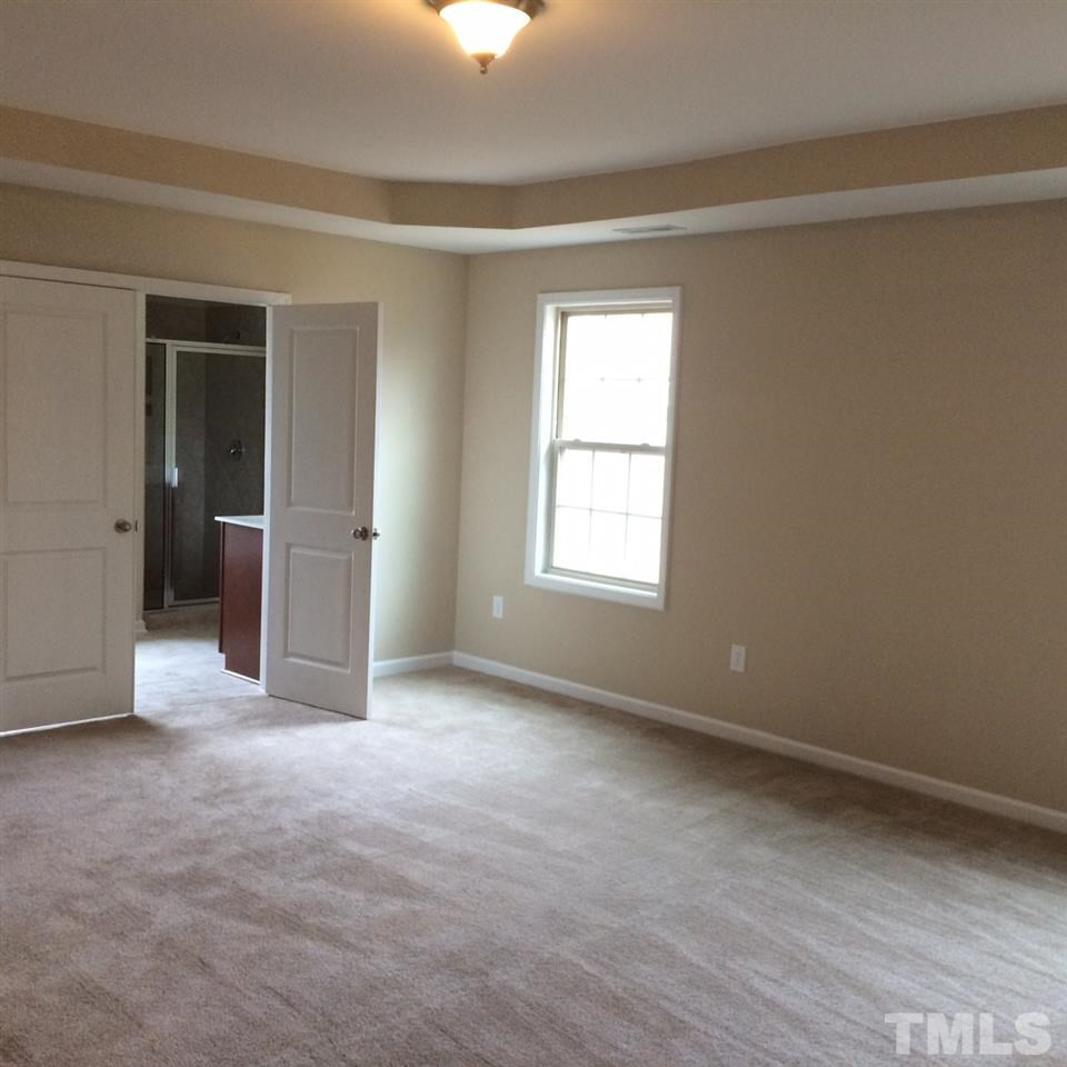 7649 Channery Way Raleigh, NC 27616 - Photo 17 of 25 check out that double door entrance to bedroom Master Bedroom