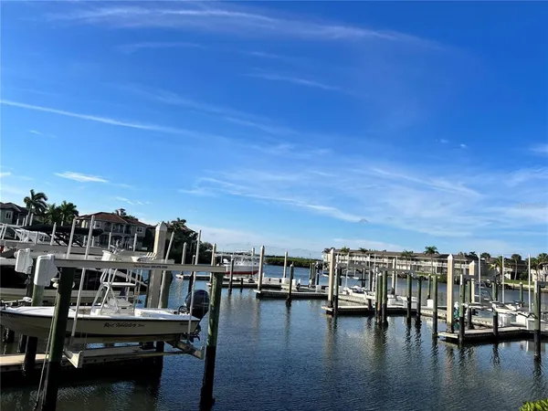 a view of a lake with a yard