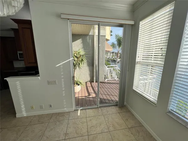 a view of balcony with furniture