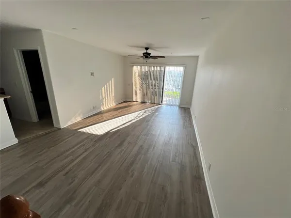 a view of a lake with a car parked