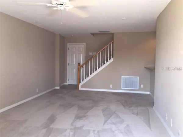 a view of a lake with a building in the background