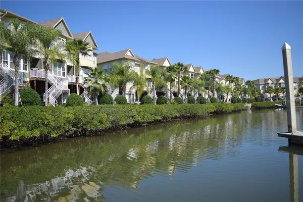a view of swimming pool with outdoor seating