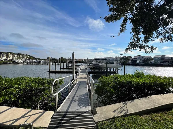 a view of a balcony with two chairs
