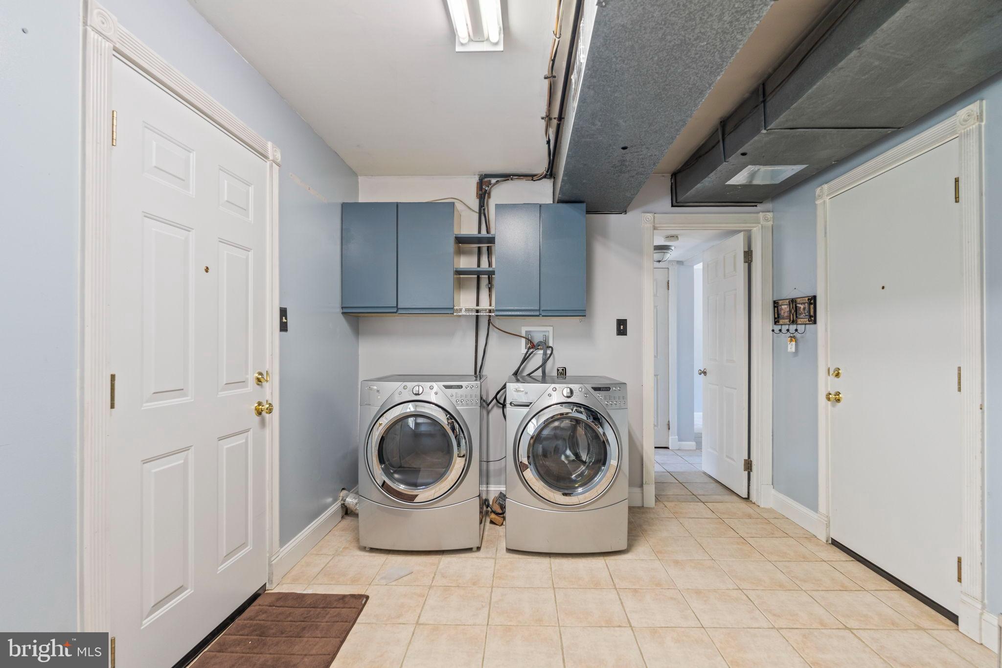 3 Spring Lake Court Sewell, NJ 08080 - Photo 17 of 36 Modern laundry space with sleek appliances.
