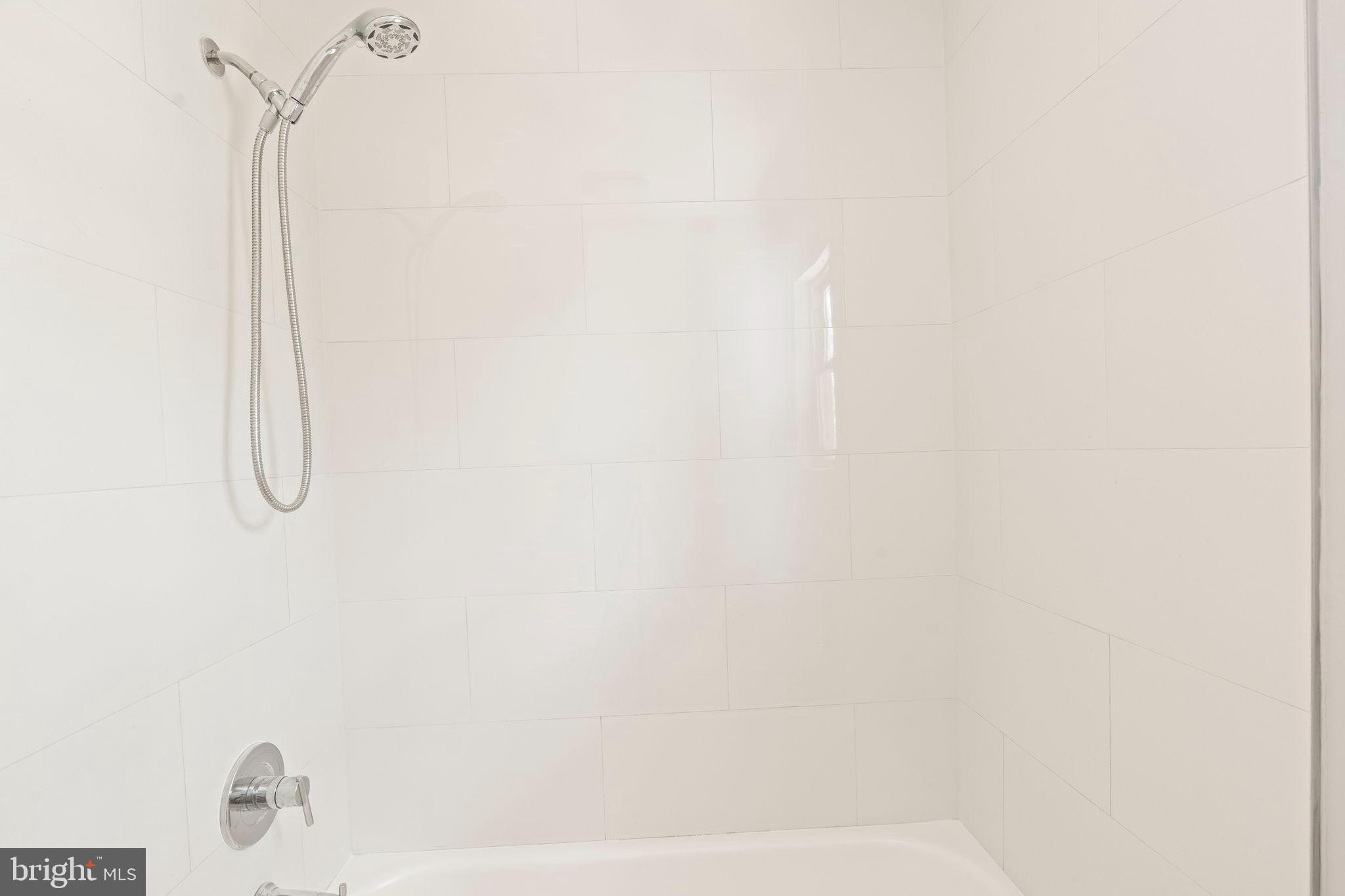 3 Spring Lake Court Sewell, NJ 08080 - Photo 21 of 36 Sleek, modern bathroom with clean lines.