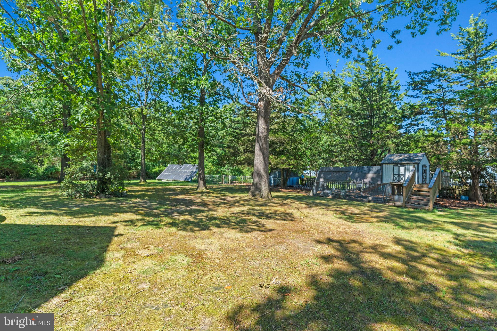 3 Spring Lake Court Sewell, NJ 08080 - Photo 28 of 36 Spacious backyard oasis with lush greenery.
