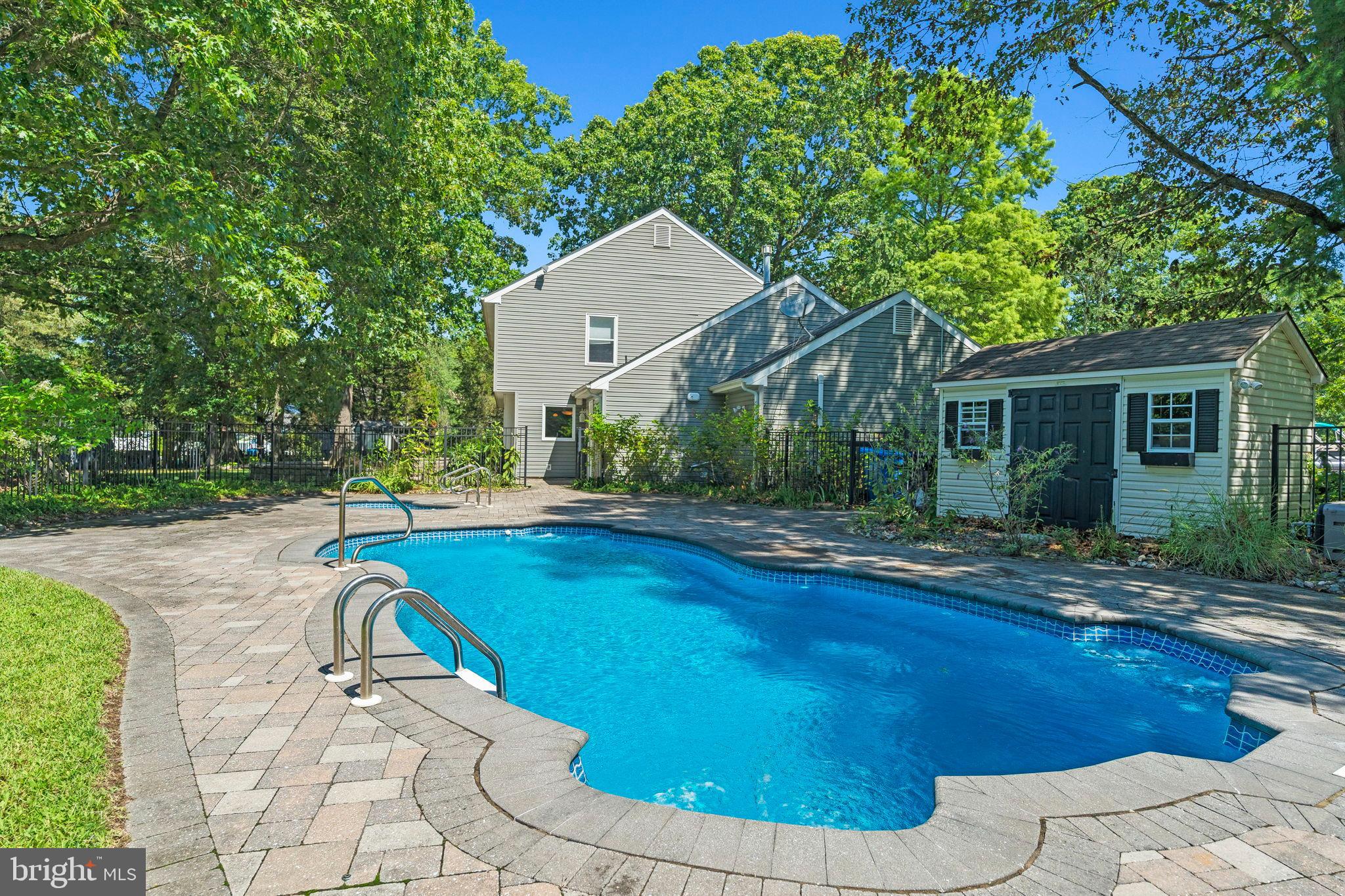 3 Spring Lake Court Sewell, NJ 08080 - Photo 33 of 36 Serene backyard oasis with inviting pool.