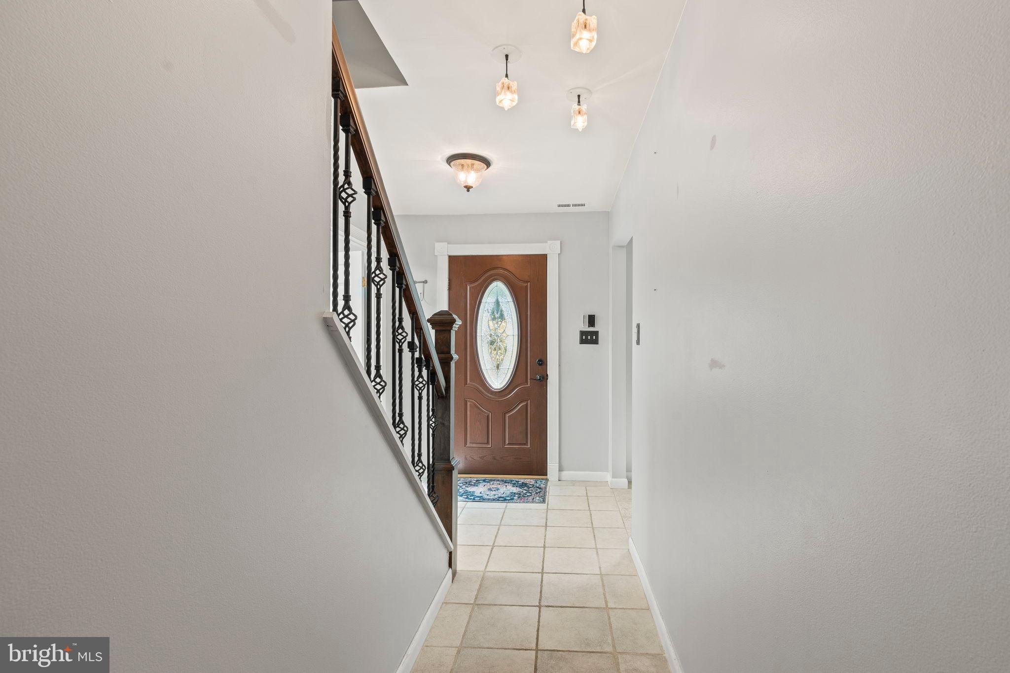 3 Spring Lake Court Sewell, NJ 08080 - Photo 9 of 36 Inviting entryway with elegant staircase.