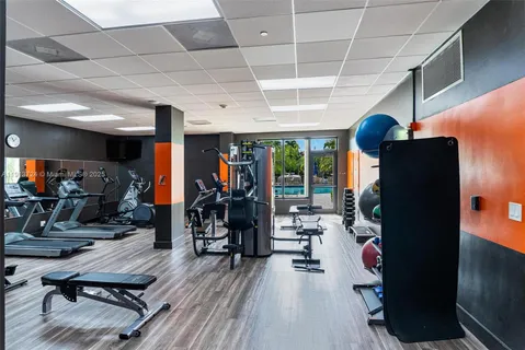 a view of a room with gym equipment