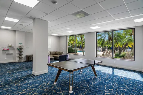 a workspace with furniture and a rug