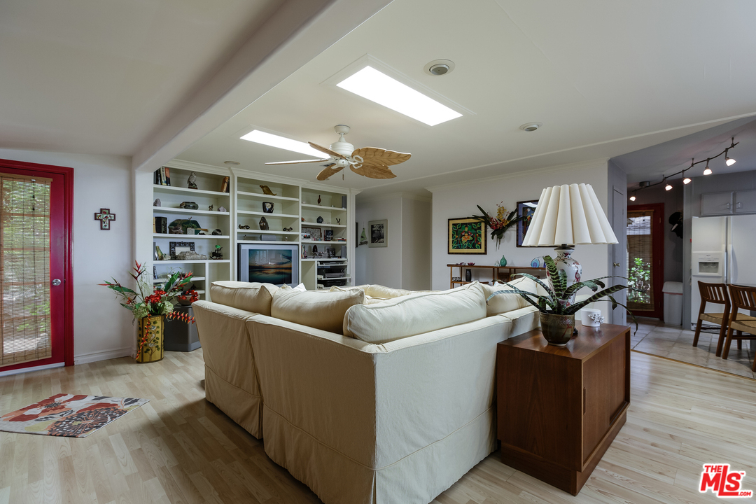 29500 Heathercliff Road, Unit 202 Malibu, CA 90265 - Photo 9 of 30 a living room with furniture and a fireplace