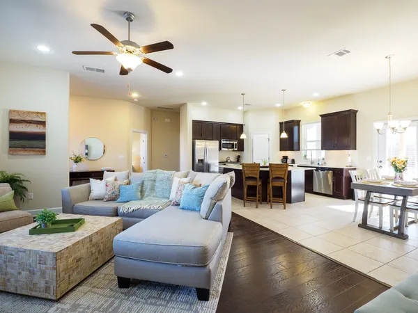 a living room with fireplace furniture and a flat screen tv