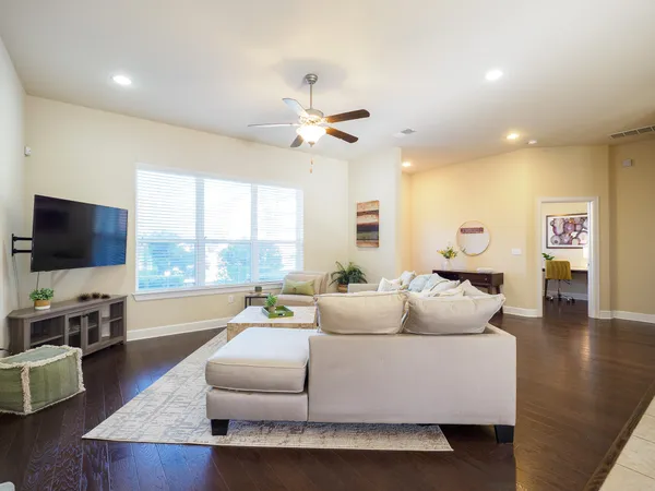 a kitchen with a dining table chairs and view kitchen