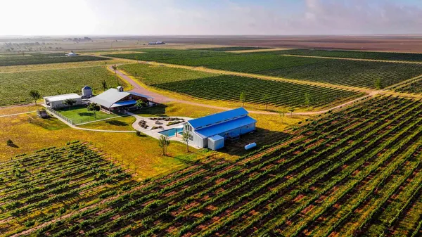 a view of a swimming pool with an ocean view