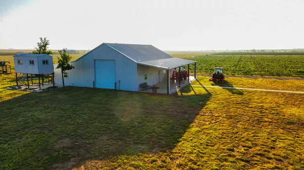 a view of a house with a ocean view
