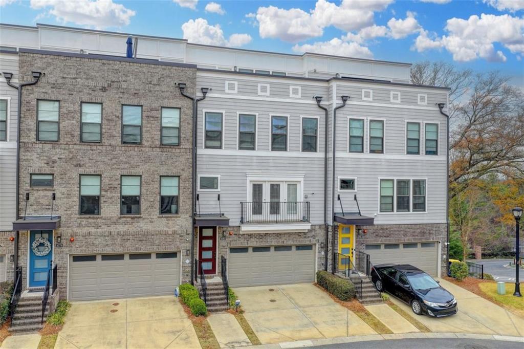 a front view of a building with glass windows