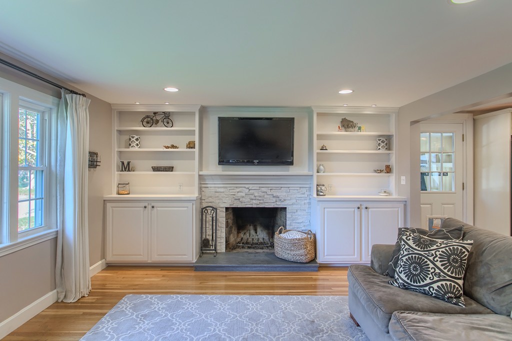 52 Margaret Road Hamilton, MA 01982 - Photo 8 of 28 a living room with furniture and a fireplace