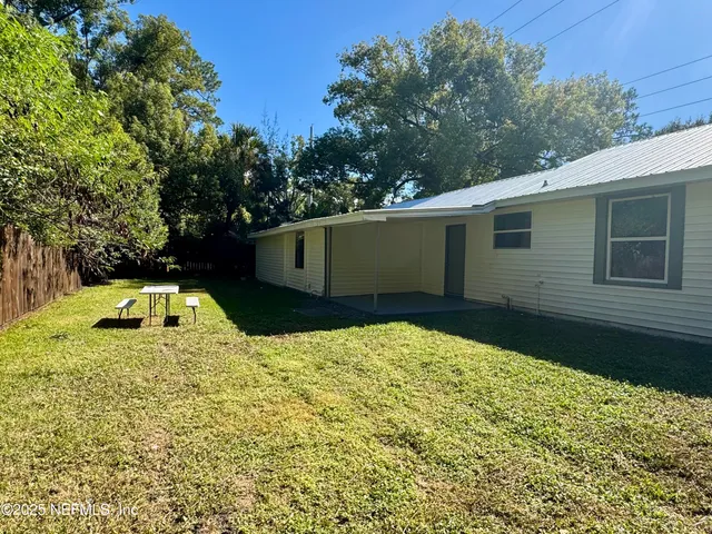 a house view with a garden space